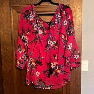 Pink flutter sleeve blouse with pink cami underneath